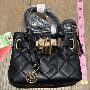 Chic Black Quilted Mini Bag with Gold Details